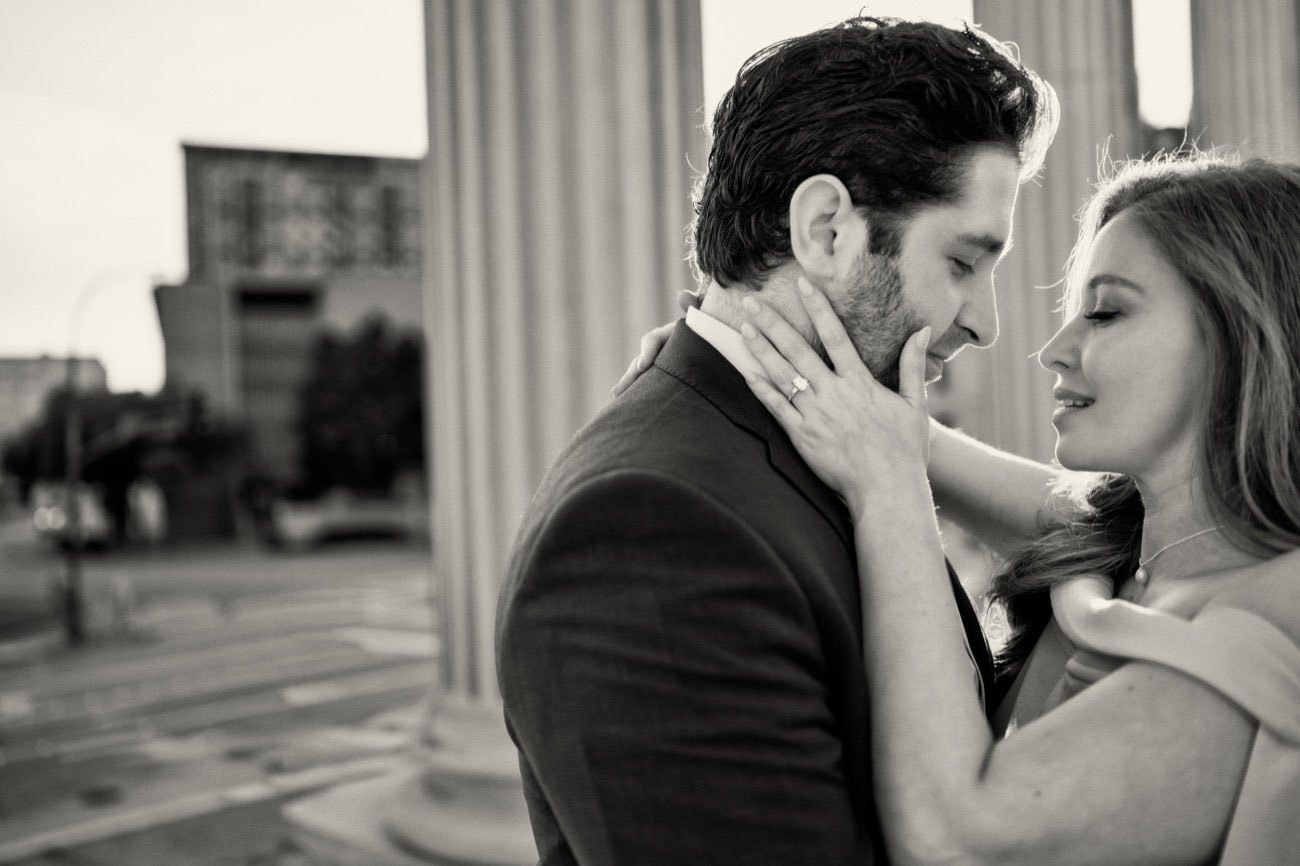 Black and white embrace during a Dallas engagement session